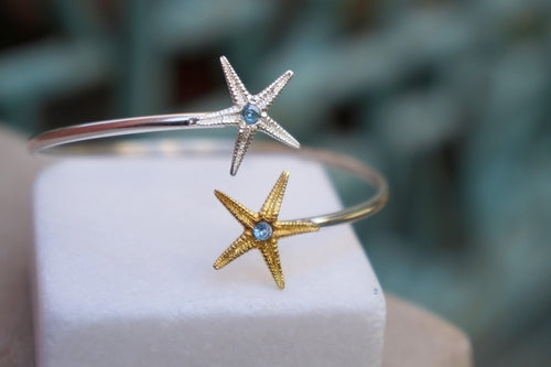 Brazalete "Estrella de los Elementos" – Plata, Oro y Circonitas Azules